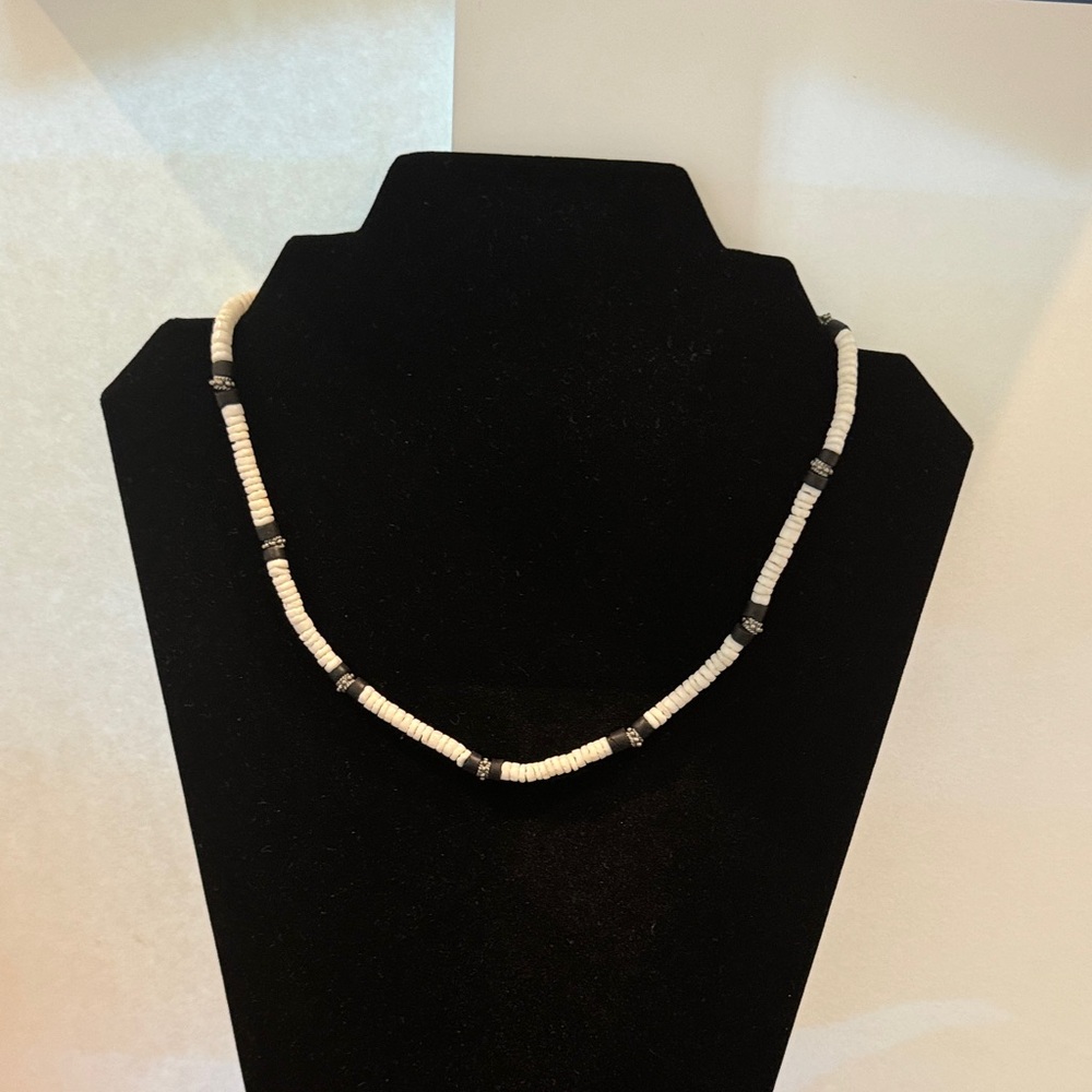 White Puka Shell Necklace with Black and Metal Accents